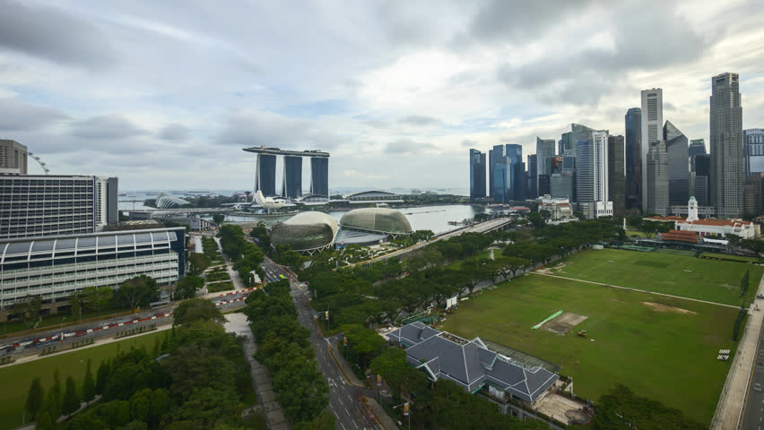 4k UHD beautiful time lapse of cloudscape bright day light at Singapore city skyline. Pan right  | Shutterstock HD Video #34589050