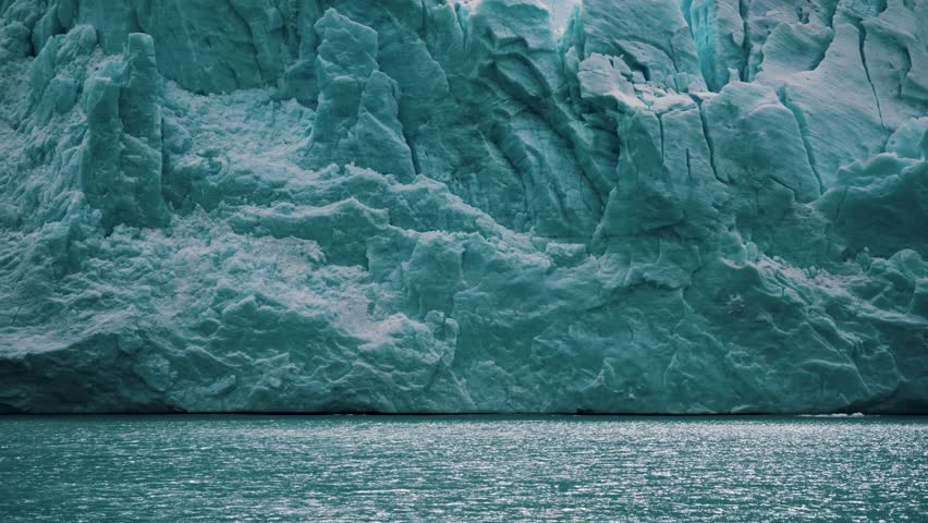 Argentino Lake Surrounded By Glaciers In Los Glaciares National Park In Patagonia, Argentina. tilt-up, panning shot Royalty-Free Stock Footage #3458997283