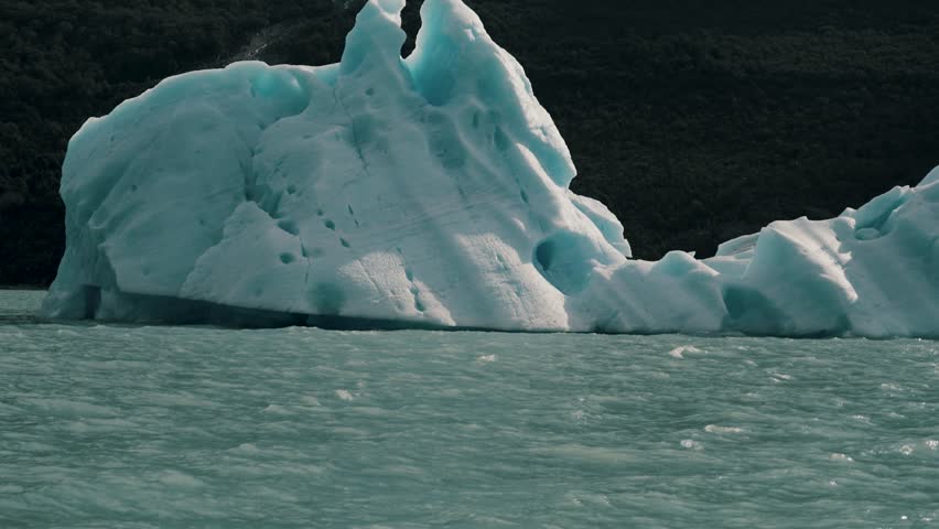 Iceberg In Glacial Argentino Lake In Los Glaciares National Park. Santa Cruz, Patagonia. Argentina. wide shot Royalty-Free Stock Footage #3458999729
