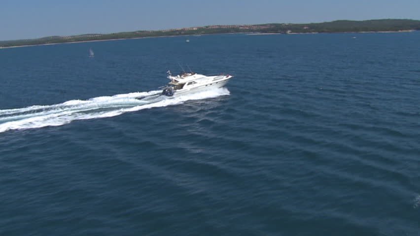A speedboat speeds across Adriatic sea near Brijuni, Croatia