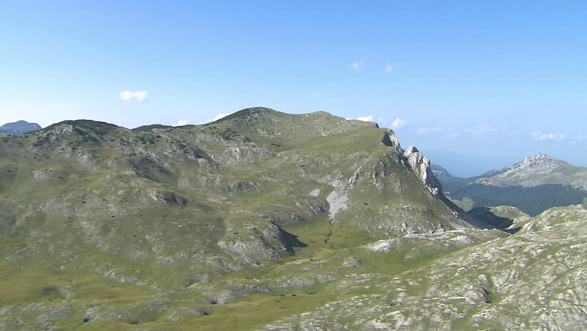 Dinaric Alps mountain environment with hills, valleys and meadows