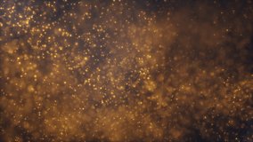 Abstract movements of luminous gold particles in the flow of liquid on a dark background. Beautiful shiny glitter floating bokeh dust with flare, animation in slow motion. 4k 60fps video loop.