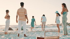 Happy people, active or playing soccer at beach on holiday, and bonding together on adventure in nature. Men, woman and friends with diversity for football game, picnic and leisure on sand by ocean - Powered by Shutterstock - Get 15% off with code: PIKWIZARD15