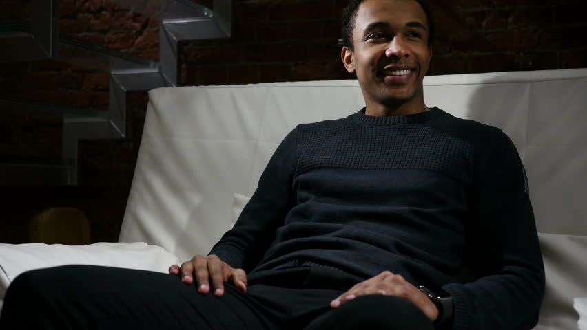 African Man Using Smartwatch for Reading Email and Messages