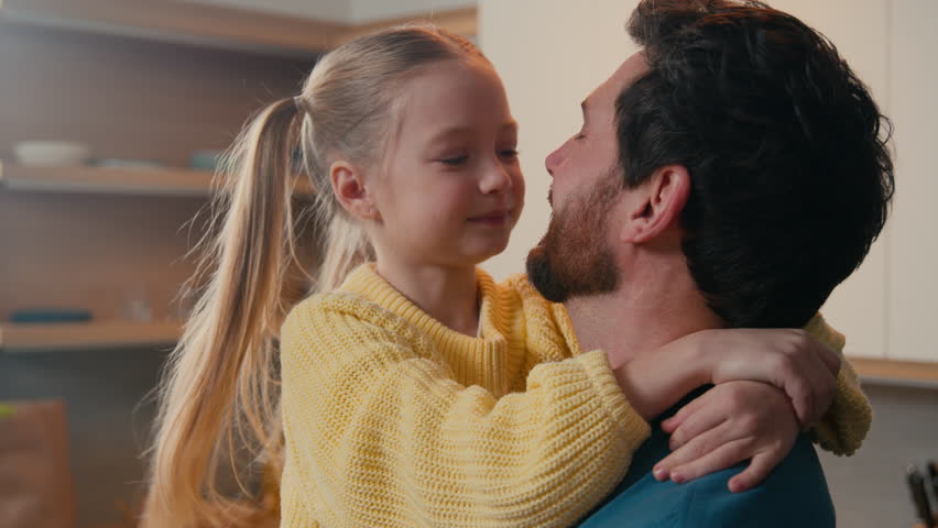 Adorable smiling happy daughter cuddle caring lovely daddy dad hug custody adoption love bond close up touch noses fooling playing game closeness together father with kid child girl hugging family Royalty-Free Stock Footage #3459071863