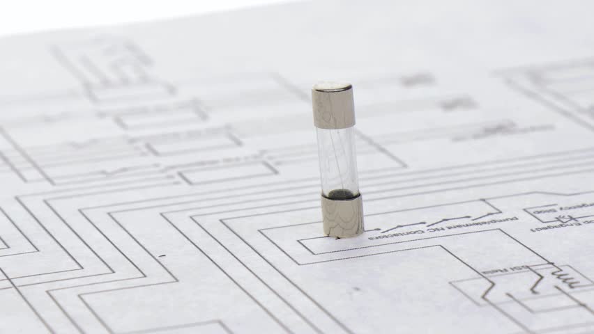 Fuses for overcurrent protection in electronics close-up on an electronic diagram. 