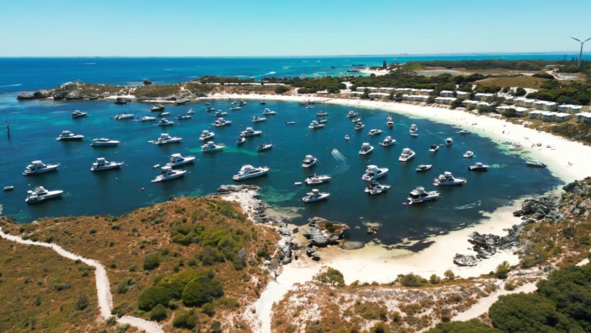 aerial drone over geordie bay on Rottnest Island with a lot of yacht on a sunny day, western australia