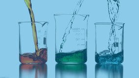 Animation of chemical formula over beakers with colourful liquid. Global science, technology and digital interface concept digitally generated video.