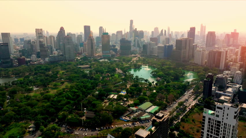 Awesome aerial view of Lumphini Park and Bangkok city in Thailand. Amazing cityscape. 