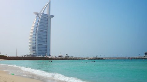 DUBAI. UAE - CIRCA OCT 2016: View to Burj Al Arab Jumeirah hotel from public beach. FullHD 1080p video