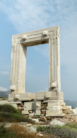 the temple of apollo, portara in naxos greece in vertical
