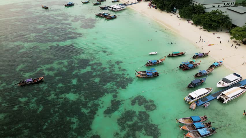 Koh Lipe - an island in Thailand with clear turquoise water and white sand on the beaches. High quality 4k footage Royalty-Free Stock Footage #3459831437