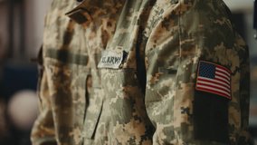 An African American soldier father returns home, greeted by son with a warm hug - Powered by Shutterstock - Get 15% off with code: PIKWIZARD15