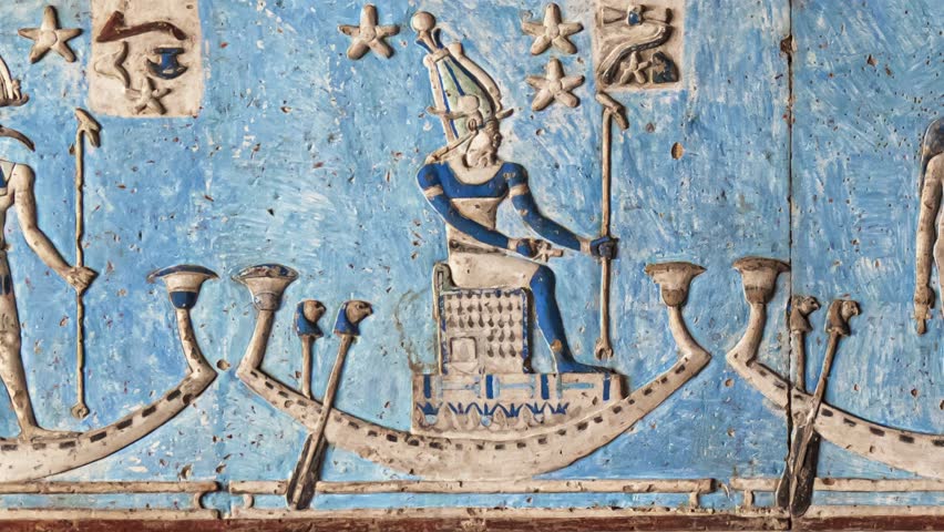 Ancient Egyptian hieroglyphs and bas-reliefs close-up in Dendera temple or Temple of Hathor. Egypt. Dendera Temple complex, one of the best-preserved temple sites from ancient Upper Egypt.