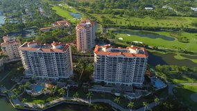 Aerial video Deering Bay neighborhood condominiums and golf courses