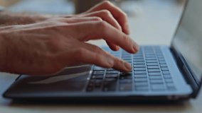 Man hands typing keyboard of laptop computer in office closeup. Business man fingers working digital device at workplace. Unrecognizable guy using notebook swiping touchpad at light cabinet interior - Powered by Shutterstock - Get 15% off with code: PIKWIZARD15