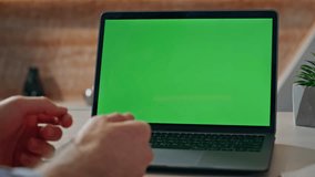 Boss video calling greenscreen laptop gesturing hands at office closeup. Unrecognizable businessman talking online conference using modern mockup computer sitting desk. Teacher speaking pc webinar  - Powered by Shutterstock - Get 15% off with code: PIKWIZARD15