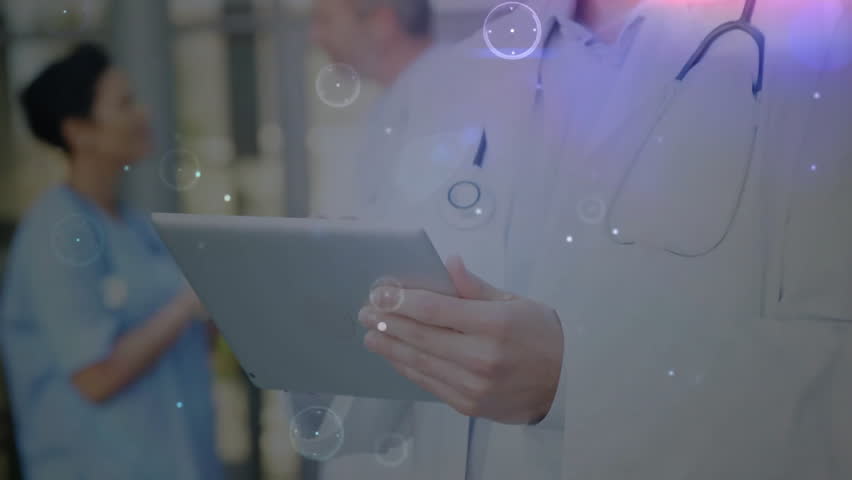 Animation of connections over diverse doctors. Global medicine, connections, computing and data processing concept digitally generated video.