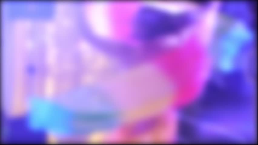 a girl dancer in a smart costume dances a belly dance at a festival with multi-colored lights and music, background. Blurred, dance technique