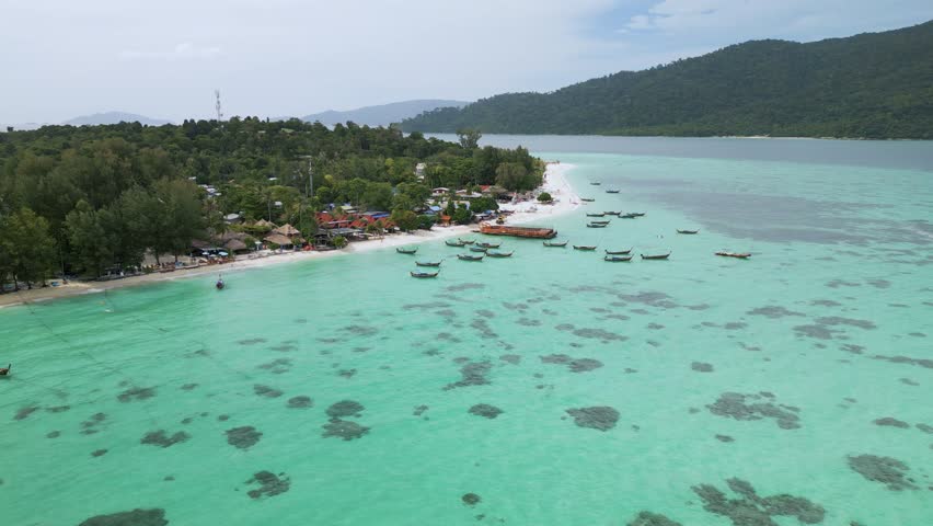 Koh Lipe - an island in Thailand with clear turquoise water and white sand on the beaches. High quality 4k footage Royalty-Free Stock Footage #3460267805