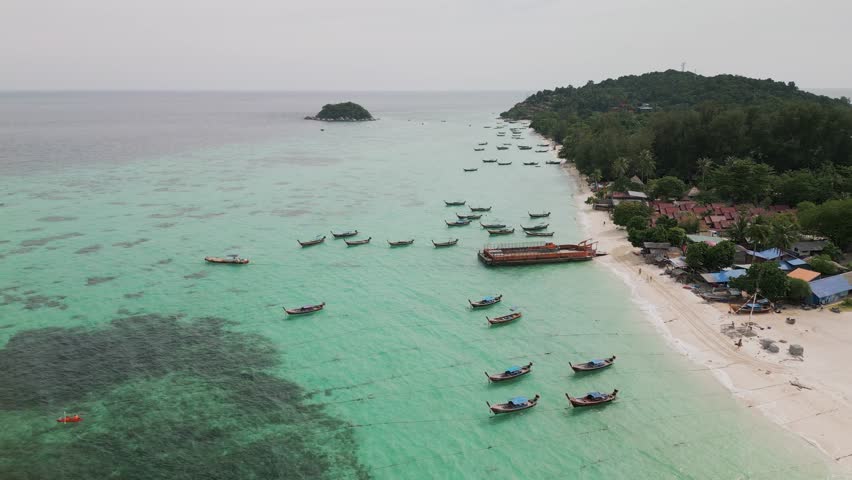Koh Lipe - an island in Thailand with clear turquoise water and white sand on the beaches. High quality 4k footage Royalty-Free Stock Footage #3460271053