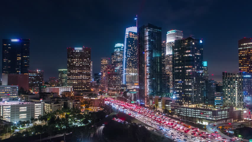 Cinematic urban aerial time lapse of downtown Los Angeles freeway with traffic | Shutterstock HD Video #34603021