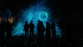 Abstract pattern of laser show rays with human contours in darkness - Powered by Shutterstock - Get 15% off with code: PIKWIZARD15