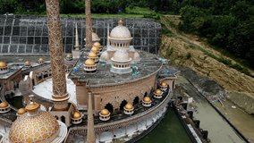 Cinematic high angle aerial view drone footage of beautiful mosque under construction