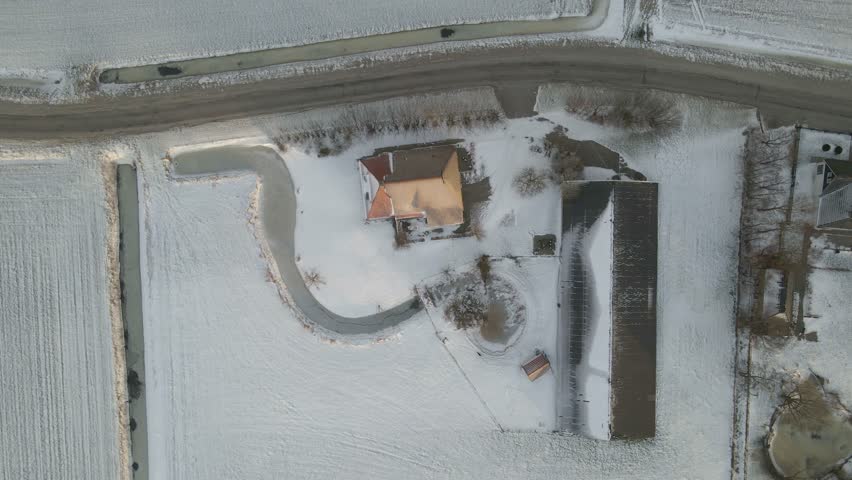 Aerial view of Dutch farm in countryside during winter