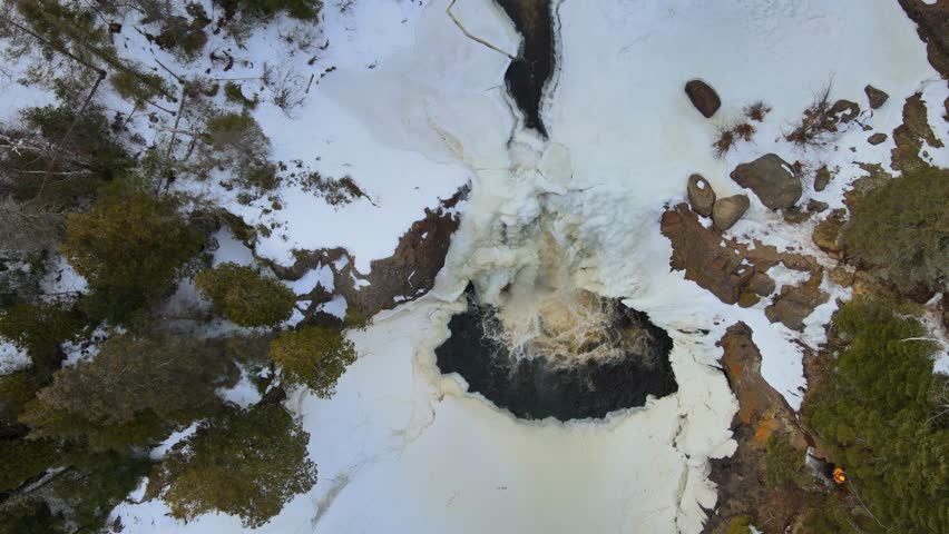 Paceful water flowing from the waterfall middle of forest in State Park of Minnesota