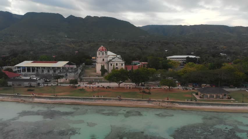 Aerial view of traditional old church near the sea at sunset, Cebu, Philippines