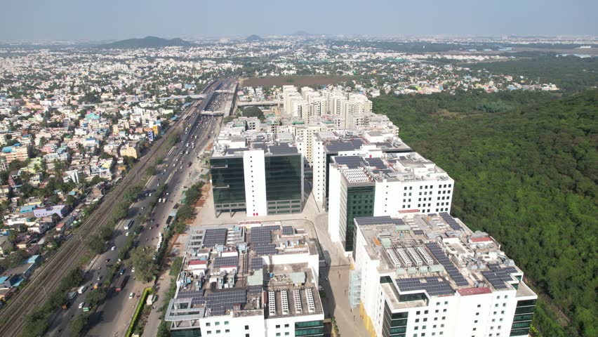 Aerial Shot of Corporate Buldings With Solar Power Panels On the Top