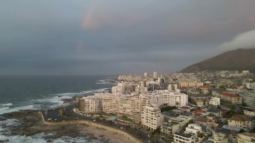 View of morning fog under Table Mountain at sunrise, Cape Town, South Africa.