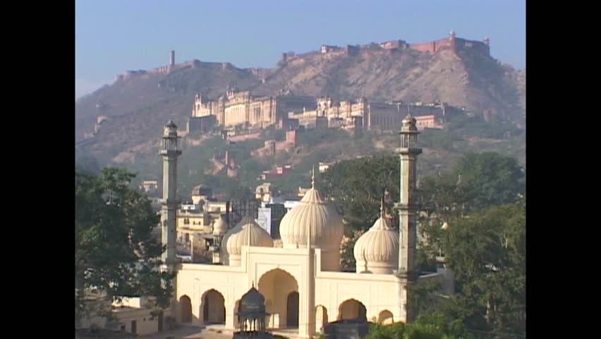 JAIPUR - 1999 - Distant exteriors of India's Amber Fort where it sits at the bottom of a mountain. Royalty-Free Stock Footage #3460623045