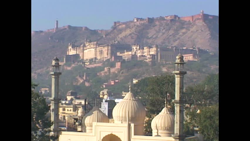 JAIPUR - 1999 - Exteriors of India's Amber Fort where it sits at the bottom of a mountain. Royalty-Free Stock Footage #3460623131