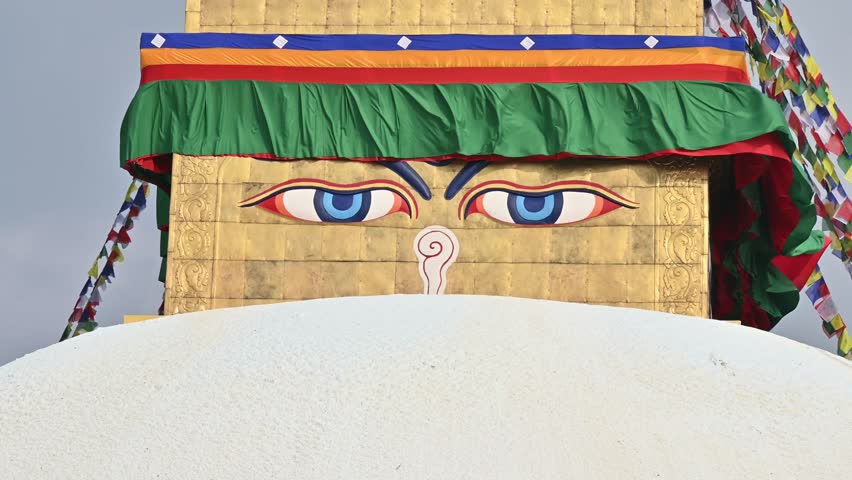 The wisdom eyes on great Boudhanath Stupa in Kathmandu, Nepal. The Great Boudhanath Stupa, built in the 5th century, is one of the most ancient, largest and magnificent Stupas in the world.