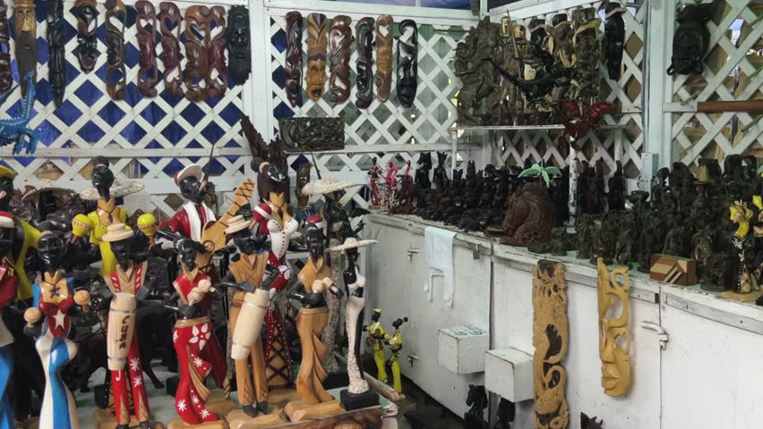 Souvenir market in Varadero. VARADERO, CUBA - DECEMBER 2023 - Caribbean holidays, vacations in Cuba, Cuban tourism. A tourist market with shops, a fair selling souvenirs, gifts, and handmade products. Royalty-Free Stock Footage #3461333739