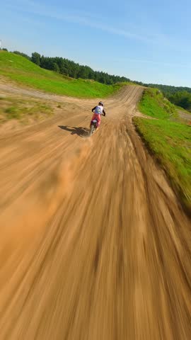 Aerial view of extreme motocross bike jump. Concepts of extreme sports, racing and adrenaline.