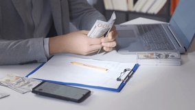 Money Calculation with Calculator, Businessman's Financial Analysis , Gain insights into financial analysis and planning as a businessman calculates money with a calculator, symbolizing meticulous - Powered by Shutterstock - Get 15% off with code: PIKWIZARD15