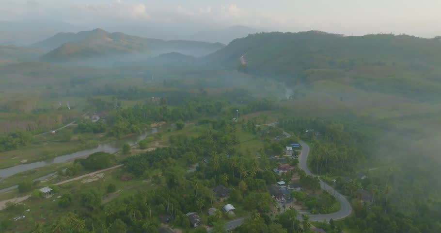 Aerial view rural village with road tropical rainforest natue landscape