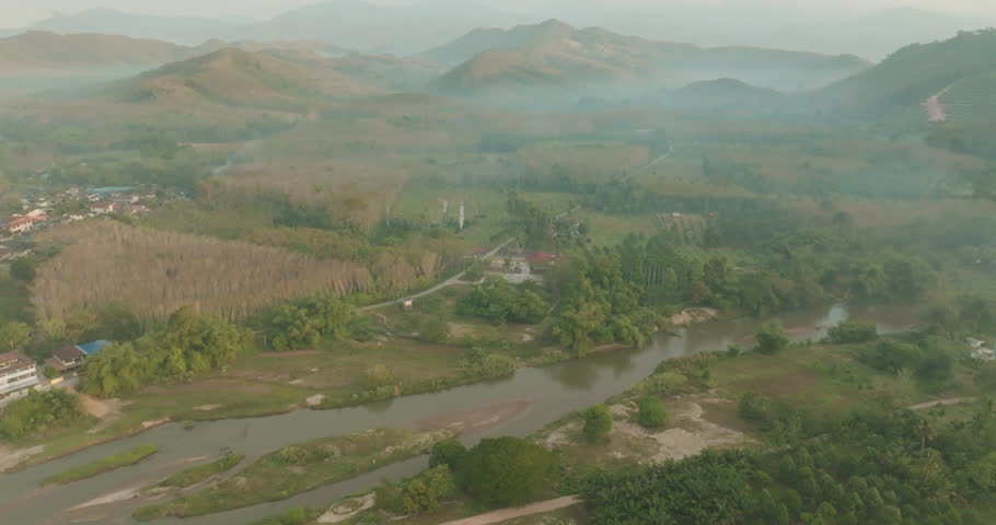 Aerial view rural village with road tropical rainforest natue landscape