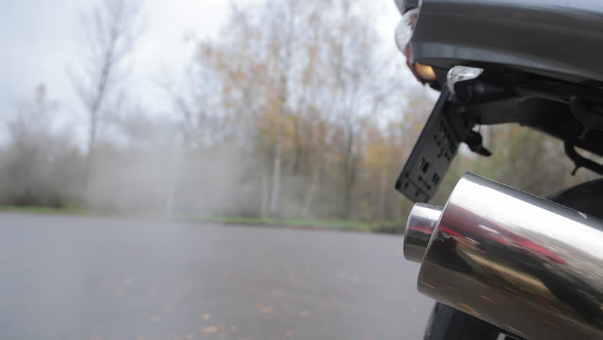 The fumes from the motorcycle and the cloudiness of the excessive middle ground. Slam the motorbike engine into the park.