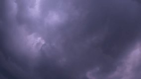 Time lapse video of a sky filled with rain clouds,blue sky with white clouds,cumulus cloud scape summer blue sky timelapse nature weather blue sky video loop white clouds background 4k video