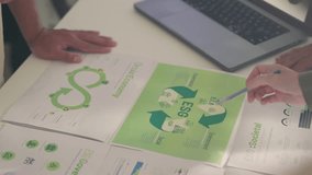 A focused group of professionals examines ESG factors and sustainability initiatives, with a clear emphasis on environmental and societal impacts. - Powered by Shutterstock - Get 15% off with code: PIKWIZARD15