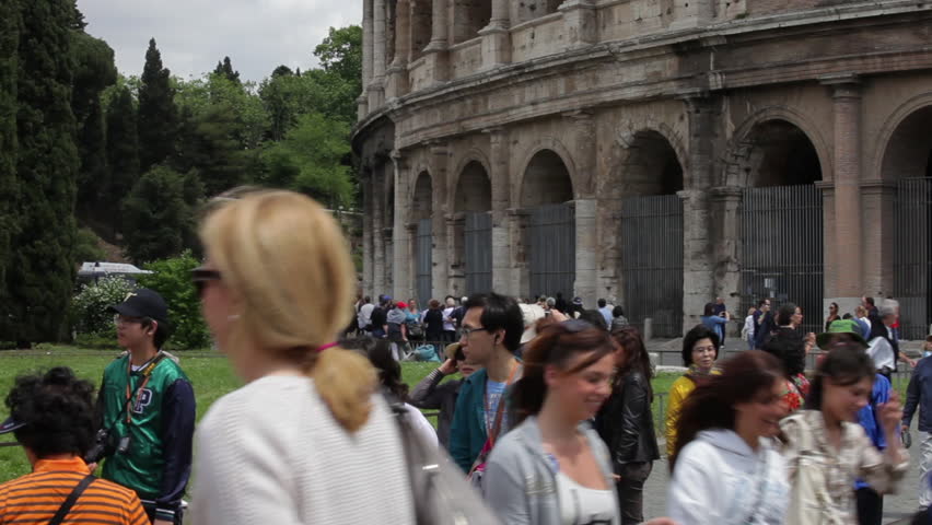 ROME - CIRCA MAY 2012: View of tourist taking photos outside the walls of the