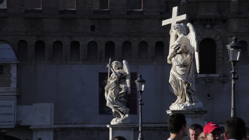 ROME - CIRCA MAY 2012: Tourists on the Ponte Sant'Angelo, with angel statues and