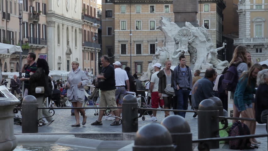ROME - CIRCA MAY 2012: Tourists in the Piazza Navona, with a view of the obelisk
