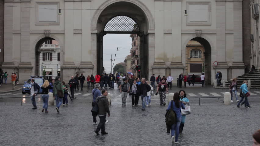 ROME - CIRCA MAY 2012: Tourists admiring the Piazza del Popolo