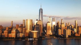 Establishing Aerial View Shot of New York City NY, NYC, United States, golden hour, beautiful light, sunset, Downtown Manhattan, One World Trade Center, Wall Street, New York Stock Exchange