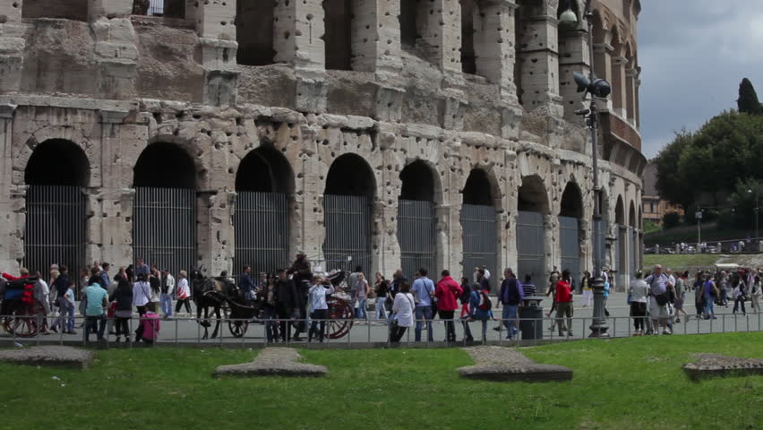 ROME - CIRCA MAY 2012: View of tourists admiring Roman Colosseum during the day
